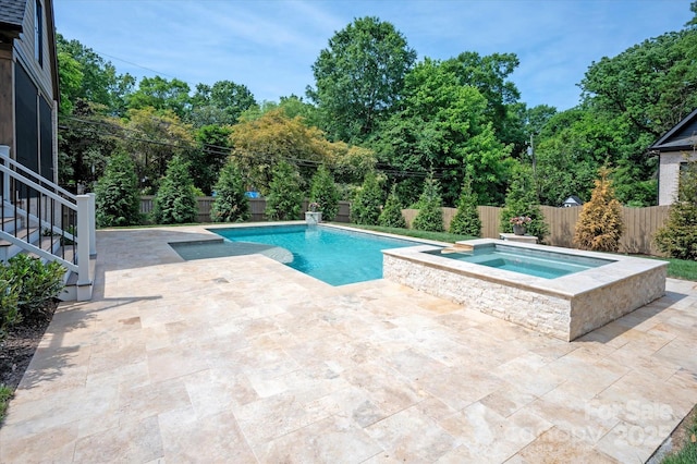 view of pool with stairs, a fenced in pool, a fenced backyard, an in ground hot tub, and a patio area