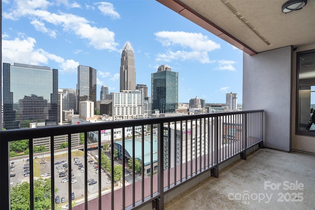 balcony featuring a city view