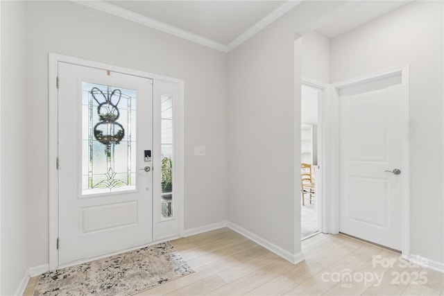 4069 Havenport Cir, Tega Cay, SC 29708 - entryway featuring crown molding, light wood-style floors, and baseboards
