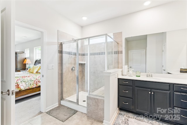 4069 Havenport Cir, Tega Cay, SC 29708 - ensuite bathroom featuring vanity, a shower stall, tile patterned floors, baseboards, and recessed lighting