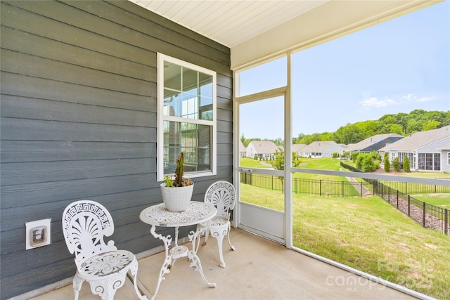 4069 Havenport Cir, Tega Cay, SC 29708 - sunroom / solarium featuring a residential view