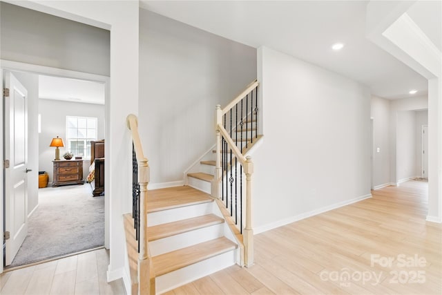 4069 Havenport Cir, Tega Cay, SC 29708 - stairway featuring wood finished floors, recessed lighting, and baseboards