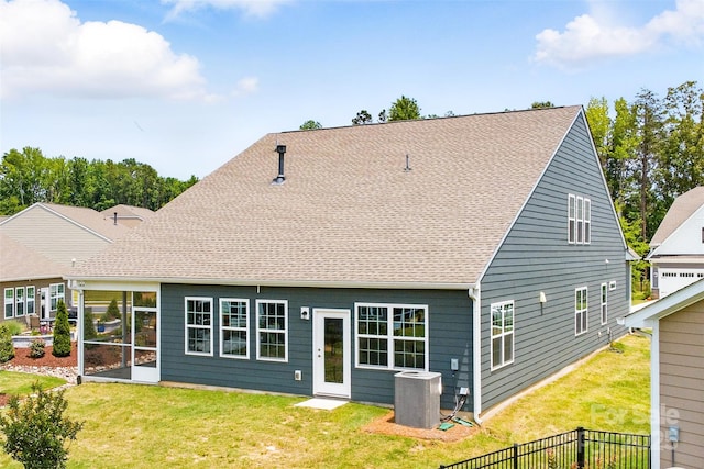 4069 Havenport Cir, Tega Cay, SC 29708 - back of house with central air condition unit, a yard, and a shingled roof