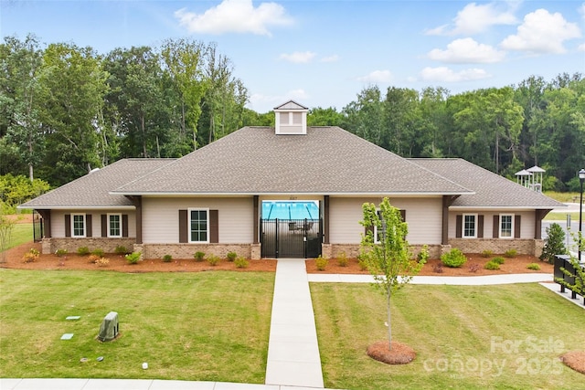 4069 Havenport Cir, Tega Cay, SC 29708 - view of front of house with a gate, brick siding, and roof with shingles