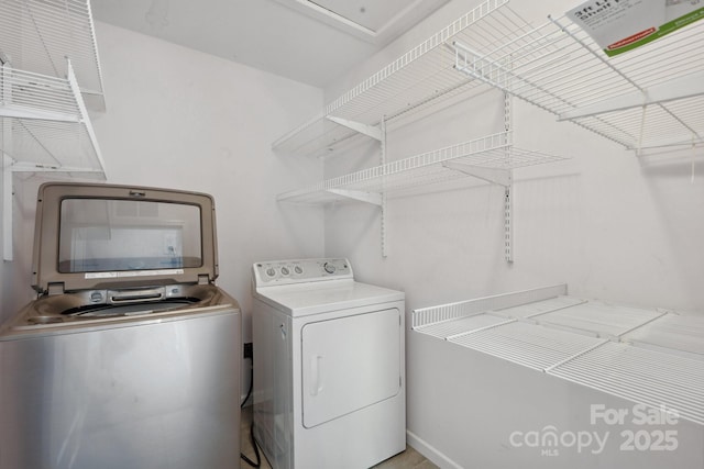 1175 Valley St Unit 111, Statesville, NC 28677 - washroom with laundry area and washer and clothes dryer