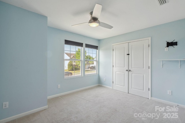 1175 Valley St Unit 111, Statesville, NC 28677 - unfurnished bedroom featuring baseboards, visible vents, and carpet