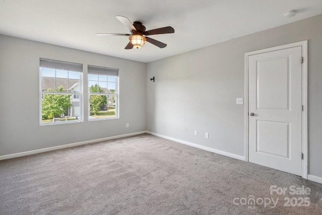 1175 Valley St Unit 111, Statesville, NC 28677 - carpeted spare room with baseboards and a ceiling fan