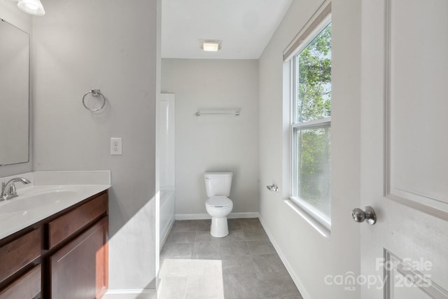 1175 Valley St Unit 111, Statesville, NC 28677 - bathroom featuring toilet, baseboards, vanity, and tile patterned flooring