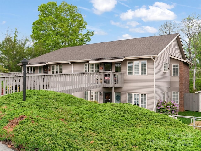 671 S Haywood St Unit 108B, Waynesville, NC 28786 - rear view of property with fence and a wooden deck