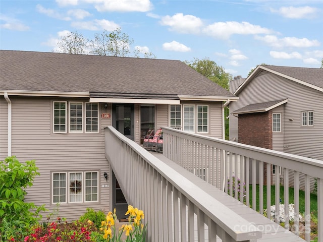 671 S Haywood St Unit 108B, Waynesville, NC 28786 - exterior space with a shingled roof and a balcony
