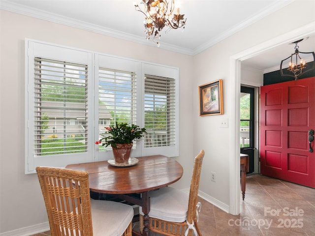 671 S Haywood St Unit 108B, Waynesville, NC 28786 - dining area with baseboards, an inviting chandelier, ornamental molding, and light tile patterned floors