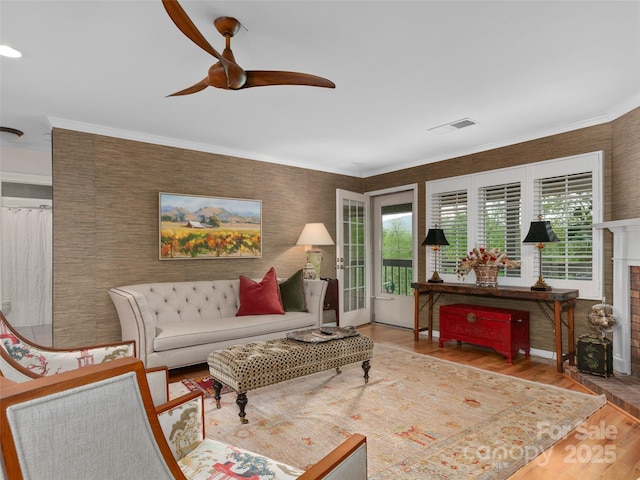 671 S Haywood St Unit 108B, Waynesville, NC 28786 - living area featuring visible vents, ceiling fan, wood finished floors, and wallpapered walls