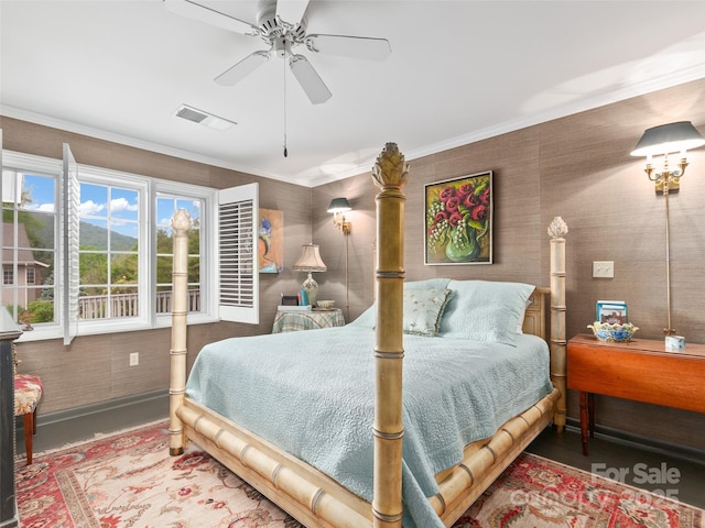 671 S Haywood St Unit 108B, Waynesville, NC 28786 - bedroom featuring visible vents, a ceiling fan, and crown molding