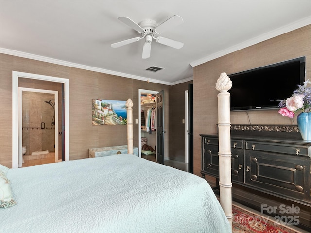671 S Haywood St Unit 108B, Waynesville, NC 28786 - bedroom with a walk in closet, a ceiling fan, visible vents, a closet, and ornamental molding