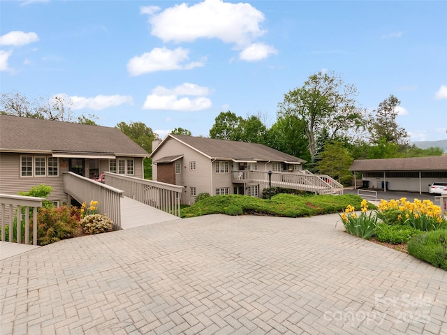 671 S Haywood St Unit 108B, Waynesville, NC 28786 - view of front of house featuring a deck and a residential view
