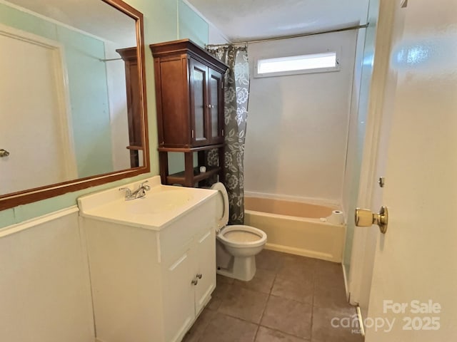 full bathroom featuring toilet, shower / bath combo, tile patterned flooring, and vanity