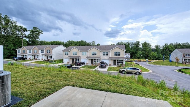 103 Eleanor Cove Rd, Arden, NC 28704 - view of yard featuring central AC unit and a residential view