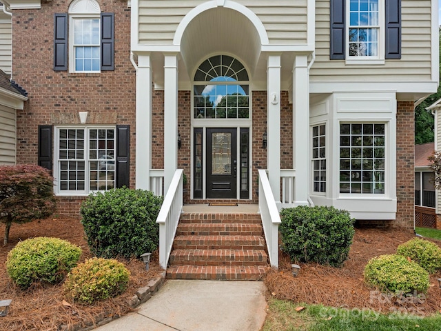 3721 Providence Plantation Ln, Charlotte, NC 28270 - property entrance featuring brick siding