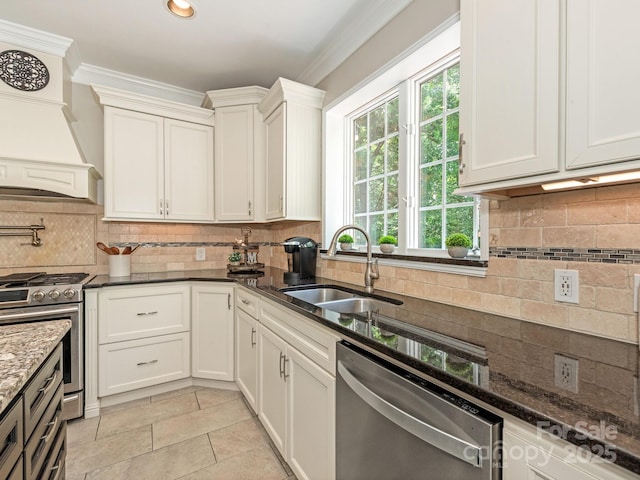 3721 Providence Plantation Ln, Charlotte, NC 28270 - kitchen featuring appliances with stainless steel finishes, a sink, tasteful backsplash, crown molding, and dark stone countertops