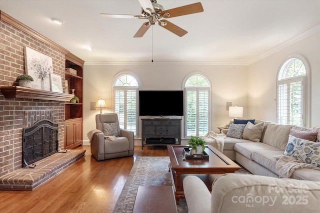 12048 Royal Portrush Dr, Charlotte, NC 28277 - living area featuring plenty of natural light, a ceiling fan, and wood finished floors
