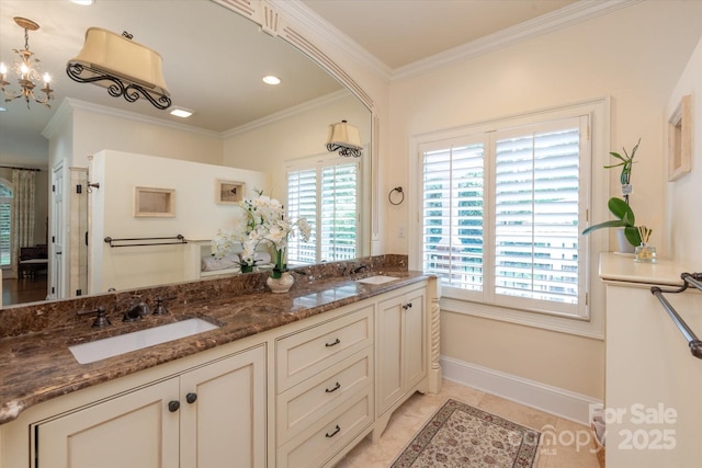 12048 Royal Portrush Dr, Charlotte, NC 28277 - bathroom with double vanity, a sink, a chandelier, and ornamental molding