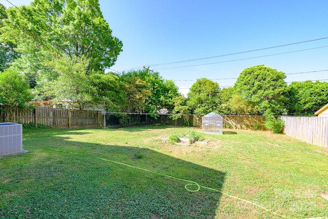4838 Holbrook Dr, Charlotte, NC 28212 - view of yard featuring an exterior structure, cooling unit, and an outbuilding