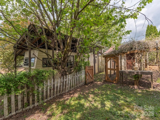 view of yard featuring fence