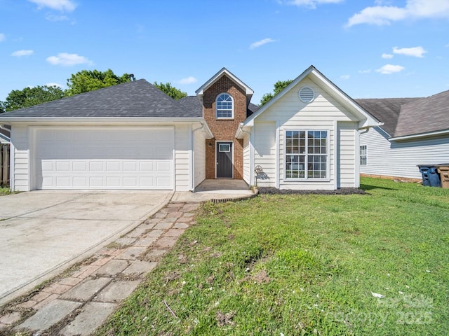4101 New Castle Ln, Monroe, NC 28110 - traditional home with driveway, a front lawn, and a garage