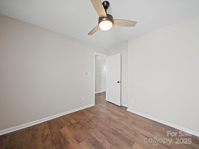 4101 New Castle Ln, Monroe, NC 28110 - unfurnished room featuring wood finished floors, a ceiling fan, and baseboards