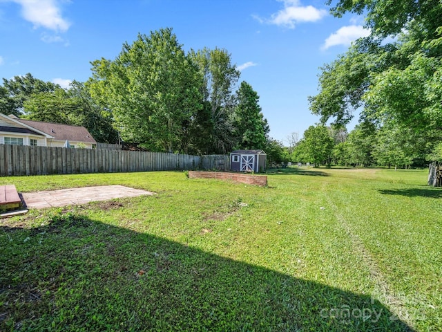 4101 New Castle Ln, Monroe, NC 28110 - view of yard with a patio area and view of wooded area