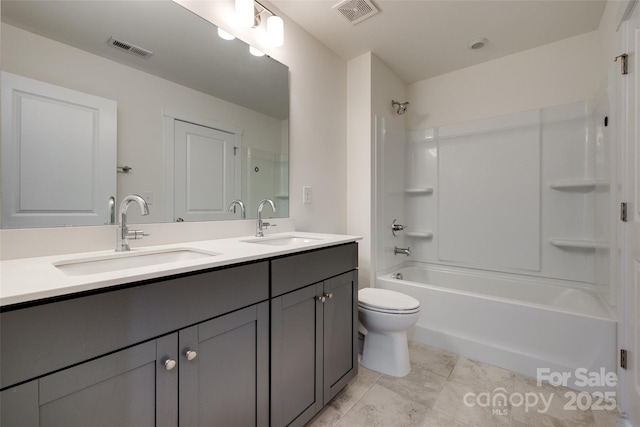 full bath featuring a sink, toilet, and visible vents
