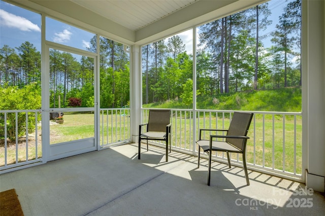sunroom featuring a healthy amount of sunlight