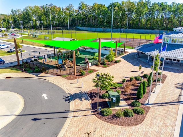 view of community featuring fence
