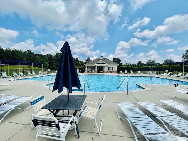 13315 Hunting Birds Ln, Charlotte, NC 28278 - community pool featuring a patio area