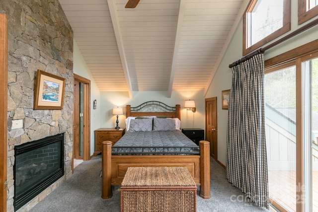 141 Ivy Ridge Rd, Burnsville, NC 28714 - bedroom with light carpet, a fireplace, and wood ceiling