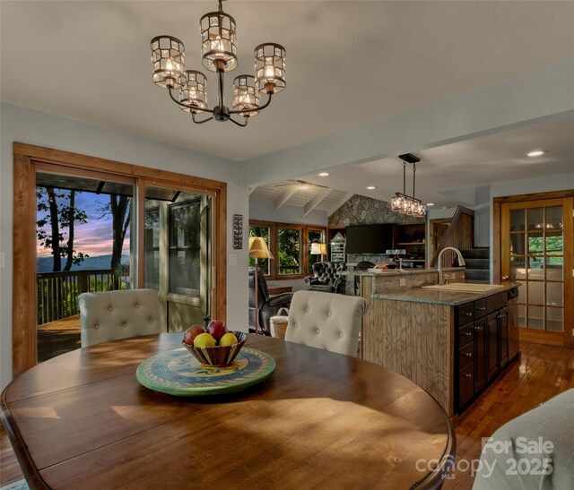 141 Ivy Ridge Rd, Burnsville, NC 28714 - dining room with a chandelier, plenty of natural light, dark wood-type flooring, and recessed lighting