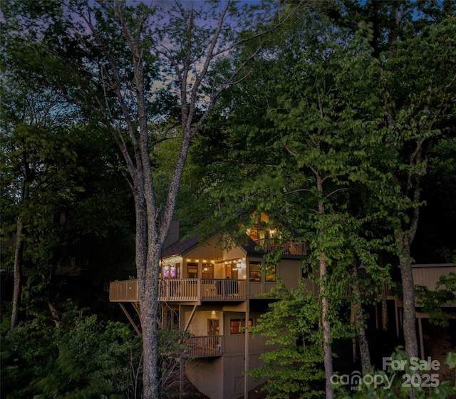 141 Ivy Ridge Rd, Burnsville, NC 28714 - view of side of home with a balcony