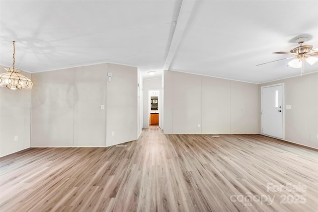 unfurnished living room featuring light wood-style floors and ceiling fan with notable chandelier