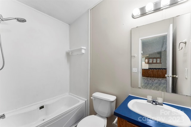 full bathroom with vanity, toilet, and  shower combination