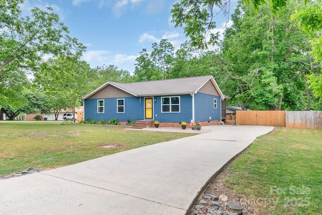 ranch-style home with driveway, a gate, and crawl space