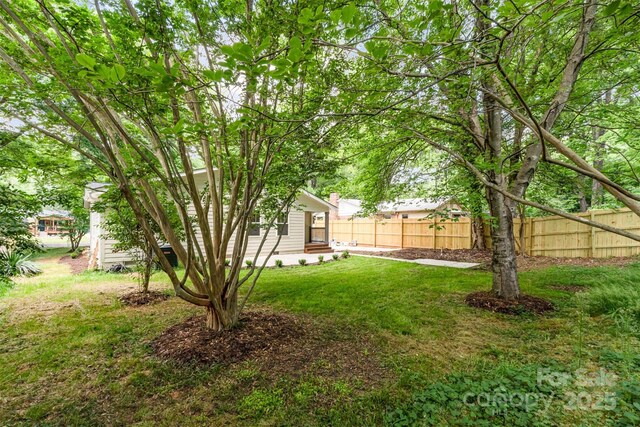 view of yard with fence