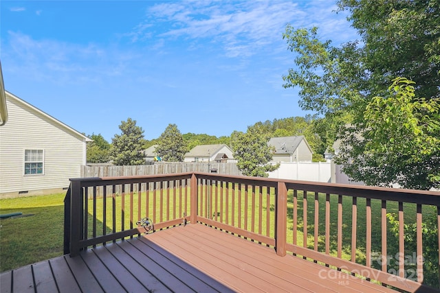 wooden deck with a residential view