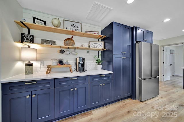 456 Rainbow Cir, Clover, SC 29710 - bar area with freestanding refrigerator, light wood-type flooring, and recessed lighting