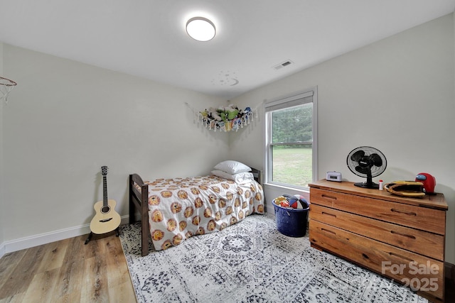 456 Rainbow Cir, Clover, SC 29710 - bedroom with wood finished floors and baseboards