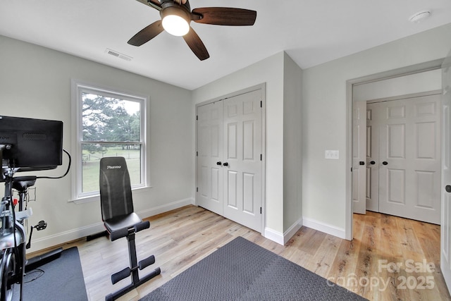456 Rainbow Cir, Clover, SC 29710 - workout room featuring ceiling fan, light wood finished floors, and baseboards