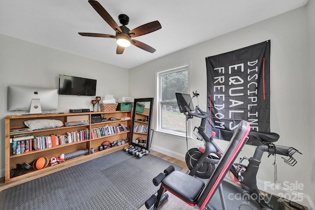 456 Rainbow Cir, Clover, SC 29710 - exercise room with ceiling fan, wood finished floors, and baseboards