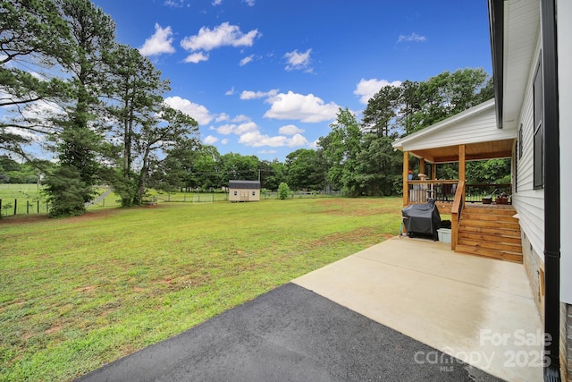 456 Rainbow Cir, Clover, SC 29710 - view of yard featuring a patio, a storage unit, and an outdoor structure