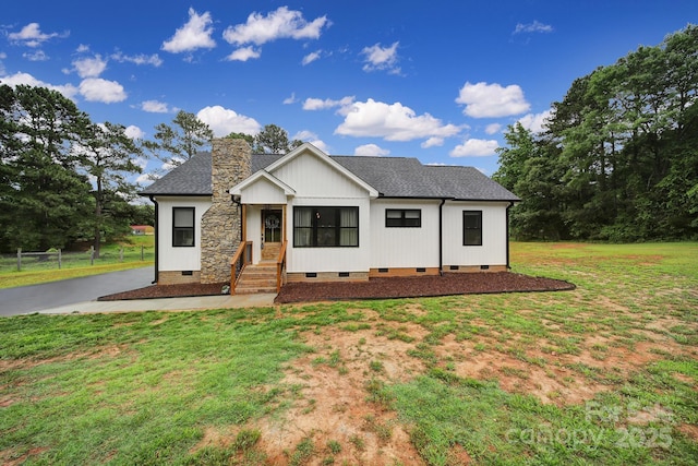 456 Rainbow Cir, Clover, SC 29710 - modern farmhouse featuring crawl space, entry steps, a chimney, and a shingled roof