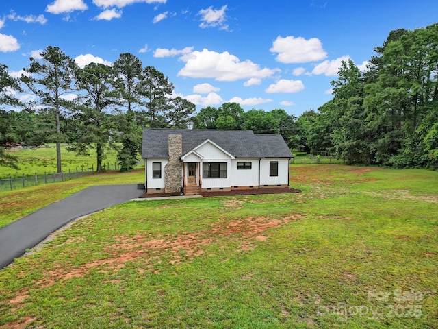 456 Rainbow Cir, Clover, SC 29710 - view of front of property with crawl space, a shingled roof, driveway, and board and batten siding