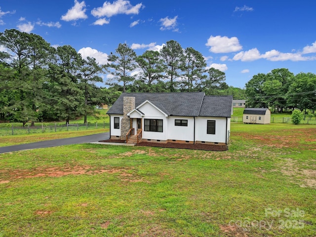 456 Rainbow Cir, Clover, SC 29710 - modern farmhouse with crawl space, an outbuilding, entry steps, a storage shed, and view of scattered trees